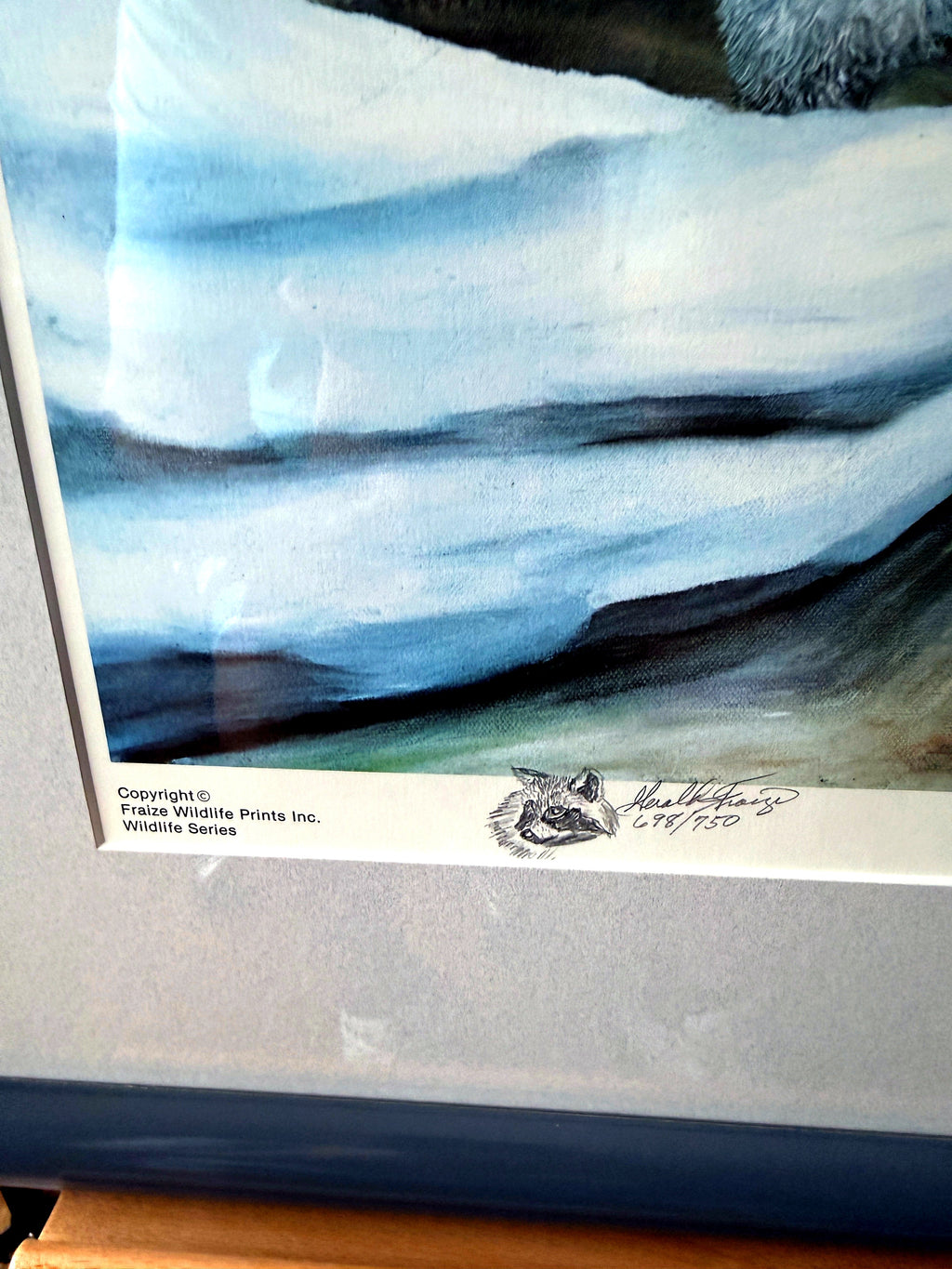 Gerald Fraize Snow In The Smokies signed and numbered print, 698 of 750 — close-up of the lower margin — copyright line, raccoon remarque and signature
