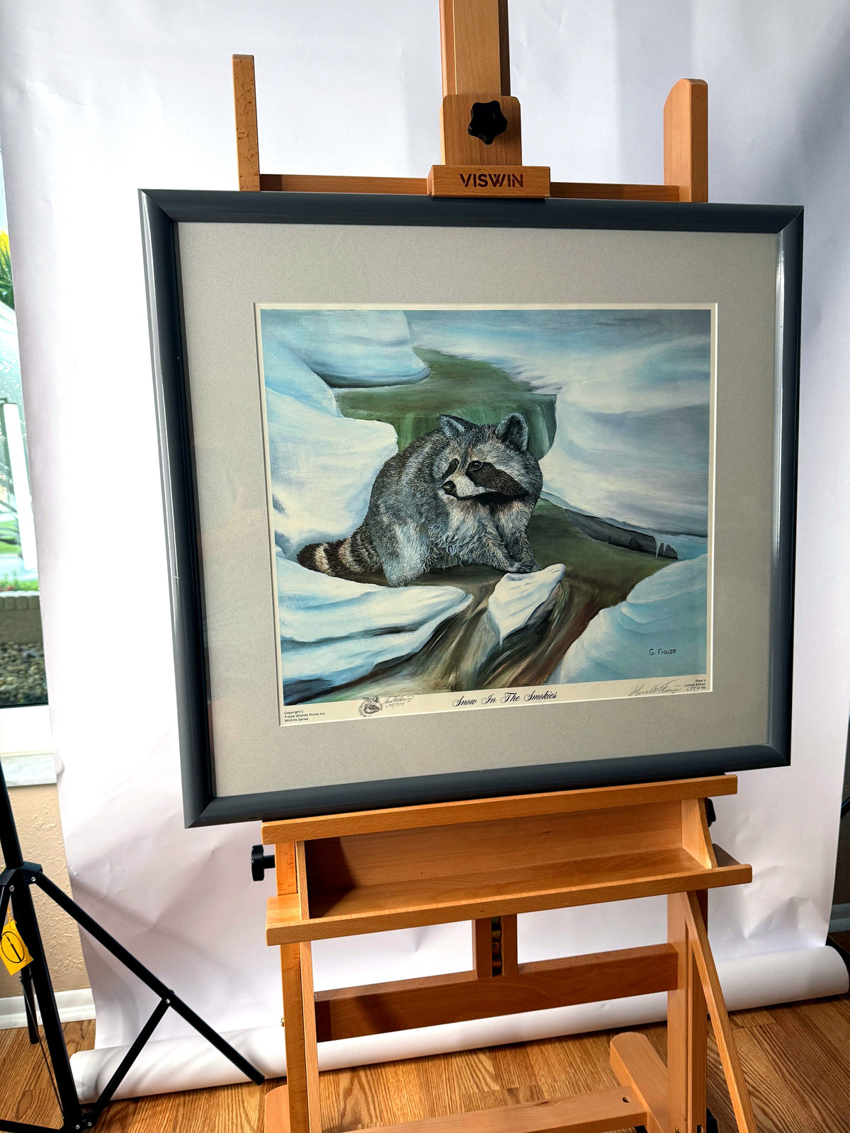 Gerald Fraize Snow In The Smokies signed and numbered print, 698 of 750 — front view on an easel, wider shot