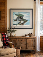 Styled lifestyle photo — the framed Snow In The Smokies print above a rustic wooden sideboard in a cozy cabin-style living room (display inspiration)