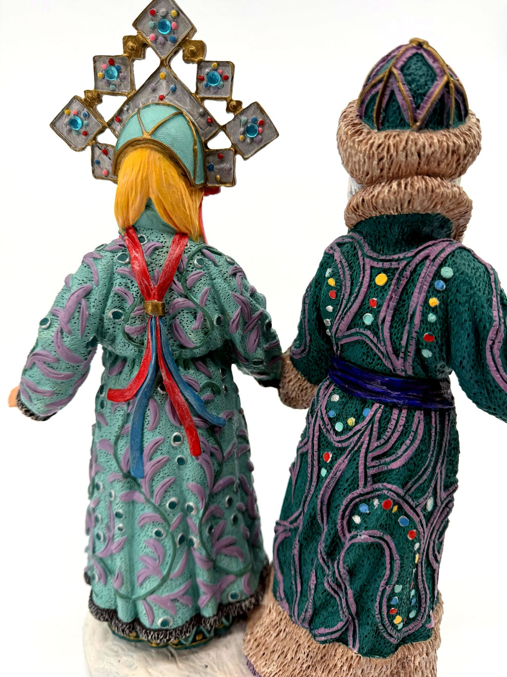 Back view of both figures, patterned robes (enhanced)