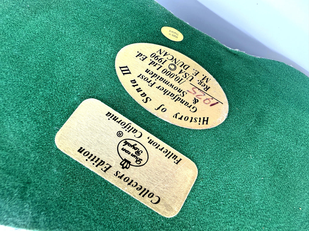 Underside plaques: History of Santa III, Grandfather Frost & Snowmaiden, Collectors Edition, M. E. Duncan, with Made in Thailand sticker (enhanced)