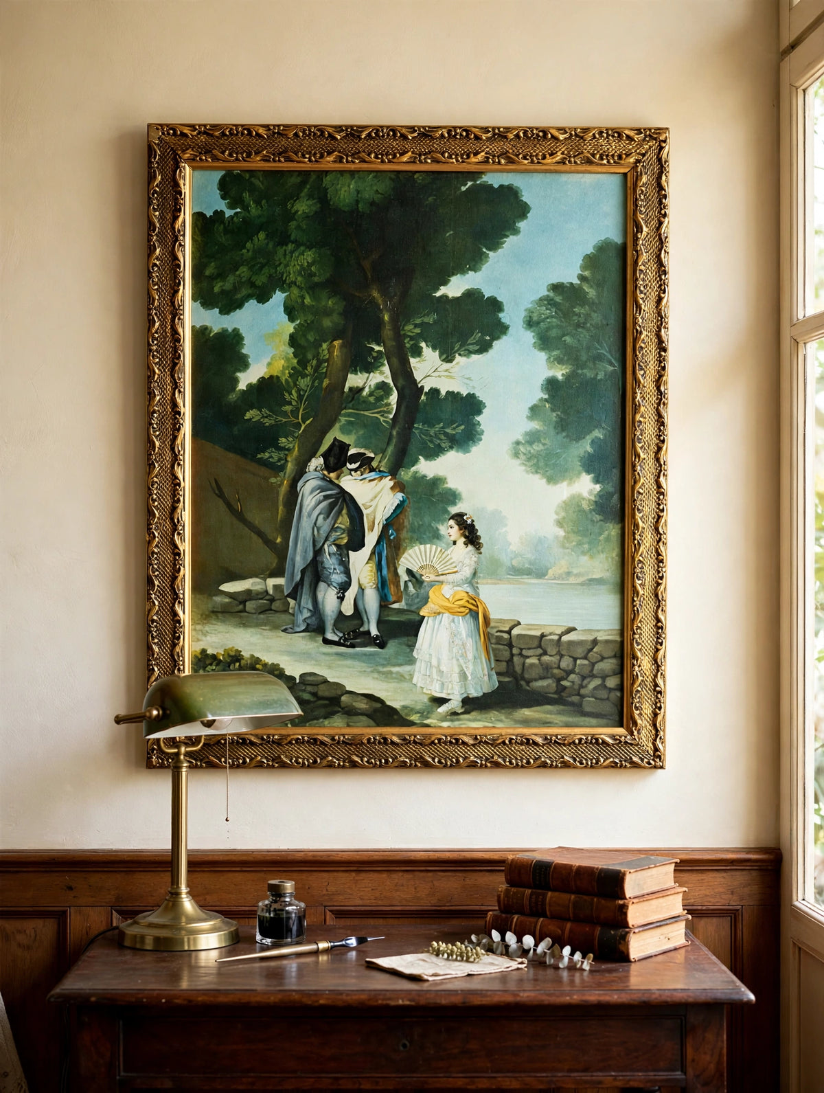 Styled lifestyle photo — the framed Goya ‘Maja and the Cloaked Men’ reproduction above a writing desk in a traditional study (display inspiration)