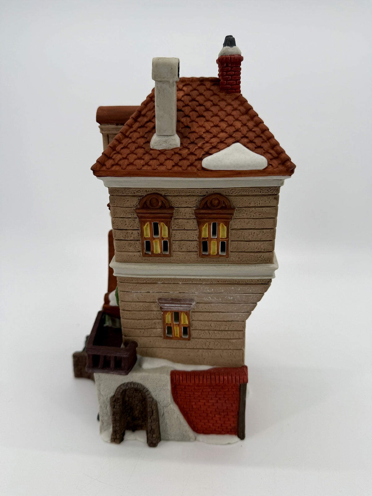 Department 56 Green Gate Cottage – back view showing the rear windows, tiled roof and snow accents