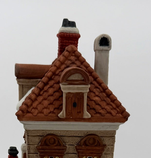 Department 56 Green Gate Cottage – detail of the tiled roof, dormer window and brick chimneys
