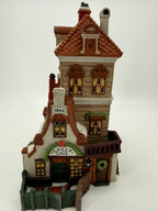 Department 56 Green Gate Cottage – close front view showing the hand-painted windows, balcony and Green Gate sign