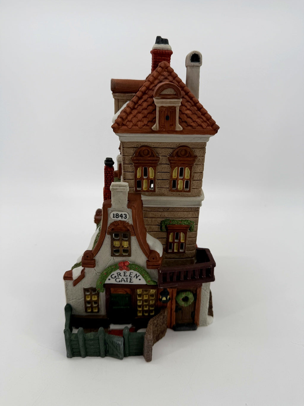 Department 56 Green Gate Cottage 1989 Dickens' Village – front view of the lighted porcelain cottage with its green gate and fence