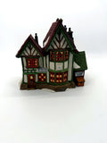 Department 56 Dickens' Village Hembleton Pewterer 1992 #5800-9 – front view with Hembleton Pewterer sign, Tudor timber framing and Tom Hawkins Chimney Sweep side shop