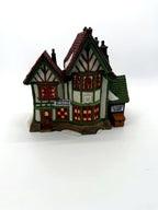 Department 56 Dickens' Village Hembleton Pewterer 1992 #5800-9 – front view with Hembleton Pewterer sign, Tudor timber framing and Tom Hawkins Chimney Sweep side shop