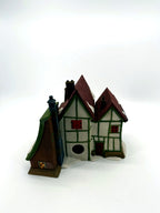 Department 56 Dickens' Village Hembleton Pewterer 1992 #5800-9 – back view showing the light opening