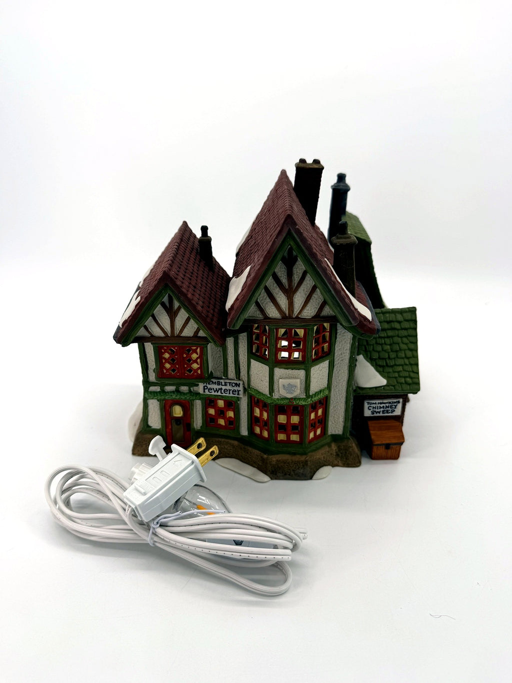 Department 56 Dickens' Village Hembleton Pewterer 1992 #5800-9 – front view with the included new replacement light cord and bulb