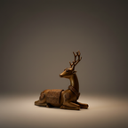 Vintage brass reclining stag deer figurine with ornate saddle detail on a warm dark studio background
