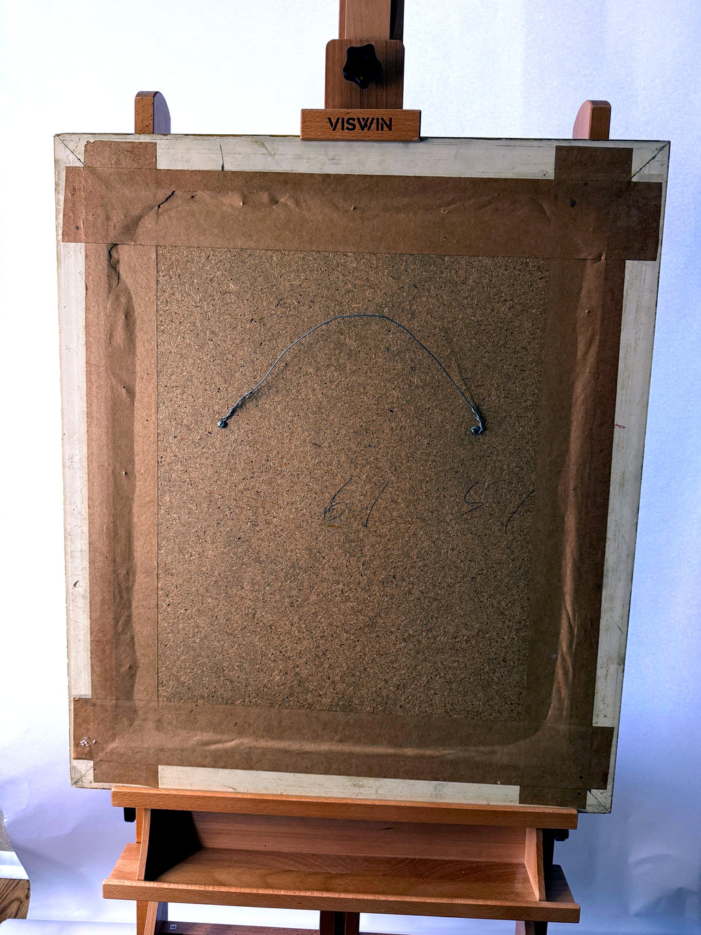 1985 signed impasto figural paintings on canvas — framed pair — the board back of the second frame on the easel