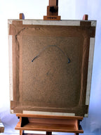 1985 signed impasto figural paintings on canvas — framed pair — the board back of the second frame on the easel