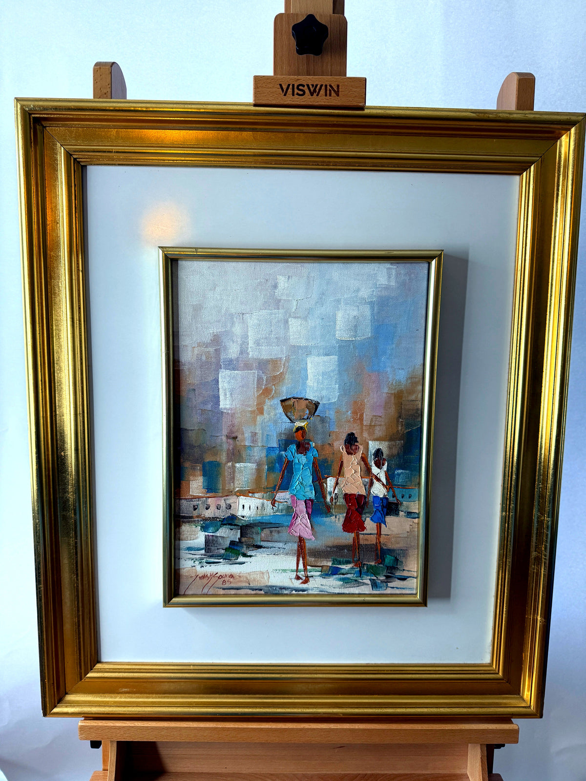 1985 signed impasto figural paintings on canvas — framed pair — the companion painting on an easel, front view