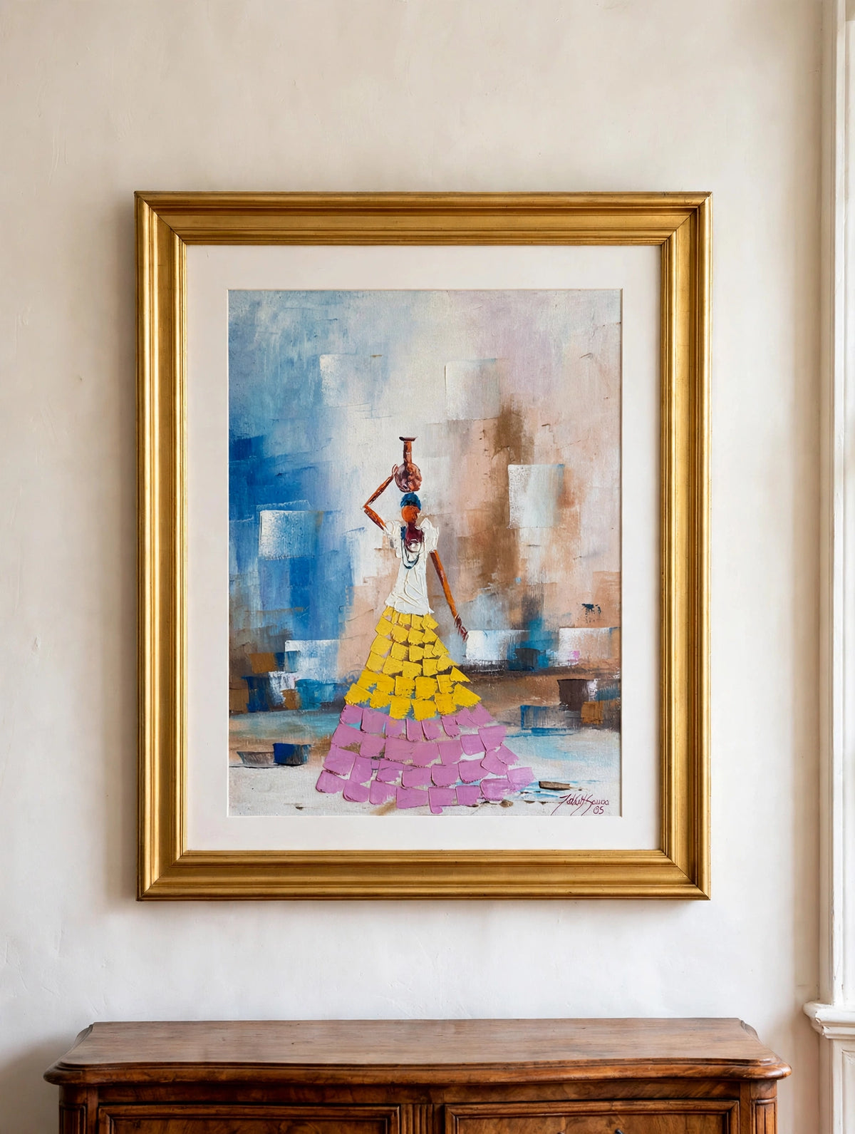 Styled lifestyle photo — the lead 1985 impasto figurative painting (woman with vessel, yellow and pink skirt) shown hanging above an antique sideboard in a vintage living room (display inspiration)