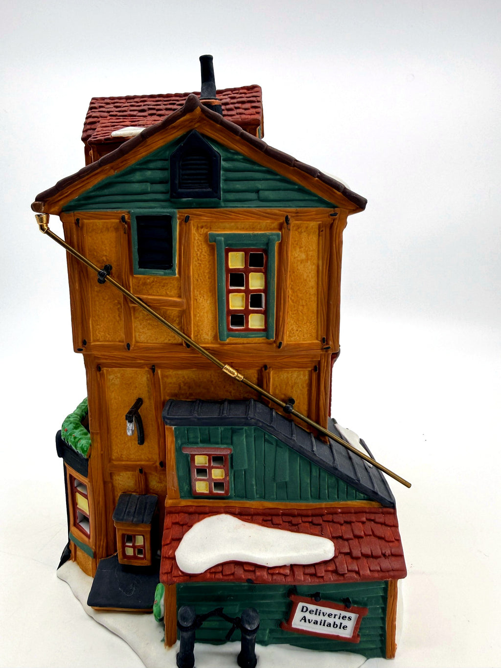 Department 56 Dickens' Village J. Lytes Coal Merchant, side view with the Deliveries Available shed and brass hoist rod