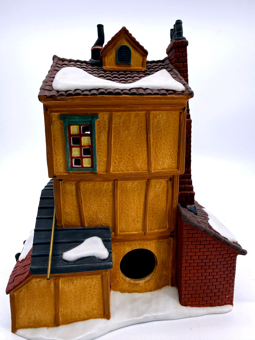 Department 56 Dickens' Village J. Lytes Coal Merchant, back view showing the round lamp opening - light untested, cord and bulb not verified