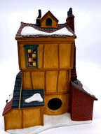 Department 56 Dickens' Village J. Lytes Coal Merchant, back view showing the round lamp opening - light untested, cord and bulb not verified
