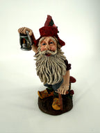 Julenisse close side-front view showing long white beard and lantern
