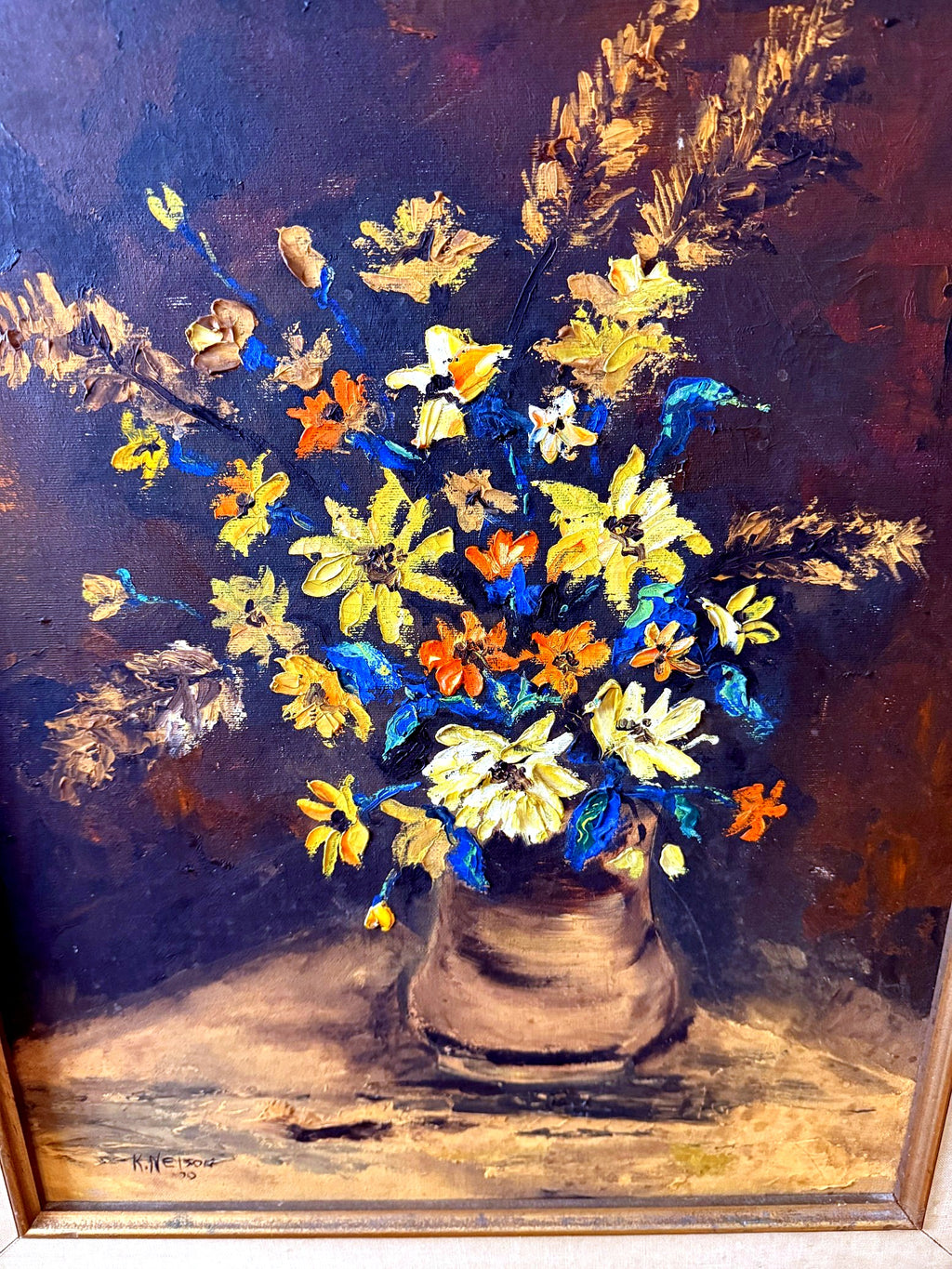 Close-up of the artwork — the impasto bouquet in yellow, orange and blue against the dark ground