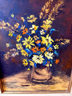 Close-up of the artwork — the impasto bouquet in yellow, orange and blue against the dark ground