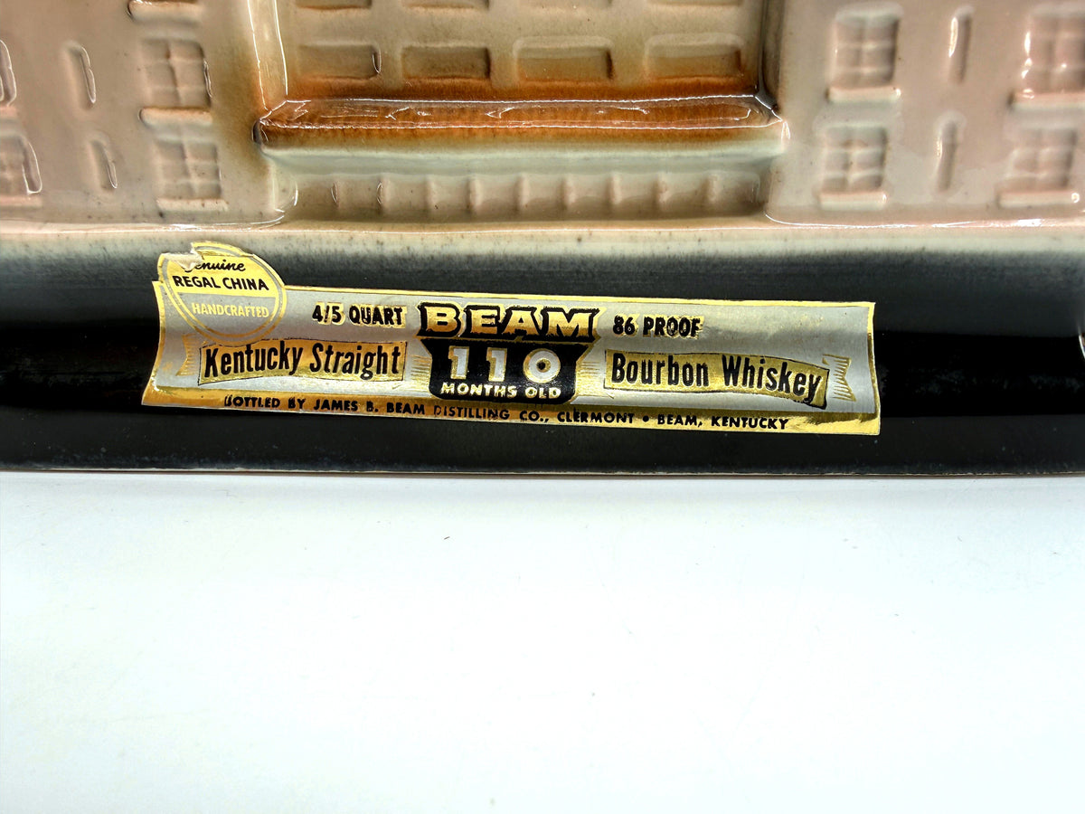 Close-up of the original Beam foil label: Kentucky Straight, 110 Months Old, Genuine Regal China Handcrafted
