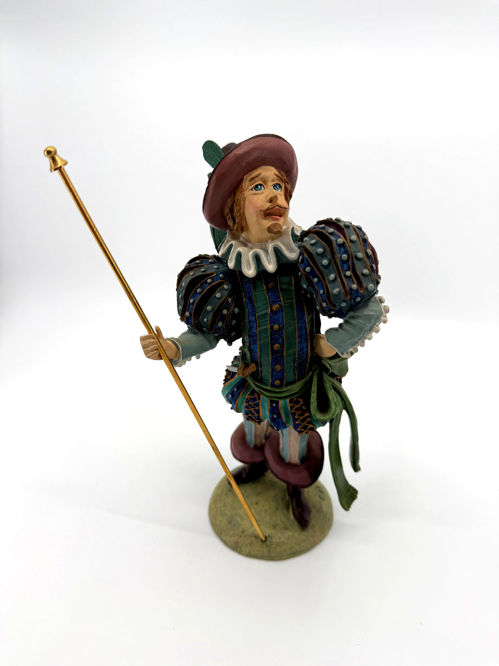 Duncan Royale Lord of Misrule figurine, front view holding gold ceremonial staff (enhanced)