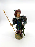 Duncan Royale Lord of Misrule figurine, front view holding gold ceremonial staff (enhanced)