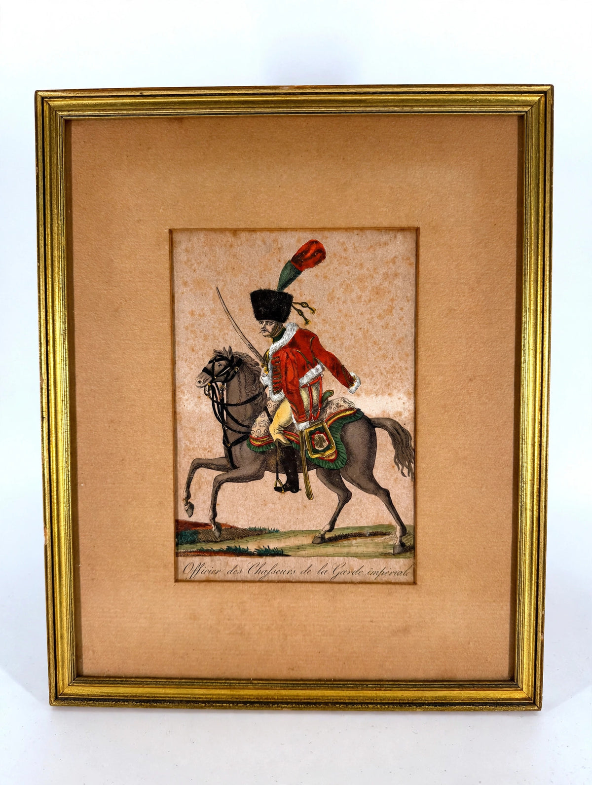 Antique Martinet Napoleonic chasseur hand-coloured print, c. 1810-1813 — the framed print on a display stand, front view