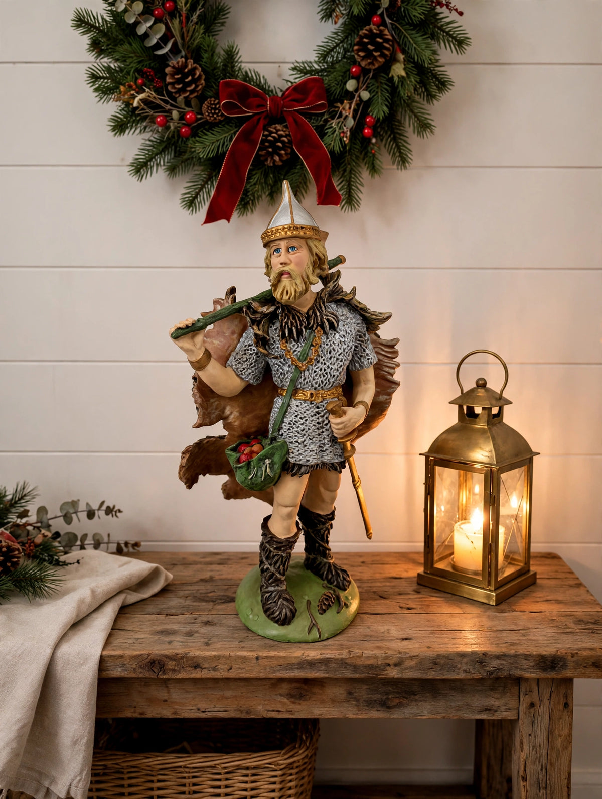 Odin on an entryway table with wreath and lantern (styled display inspiration)