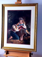 Emile Munier The Knitting Lesson framed art print — front view on an easel, straight on