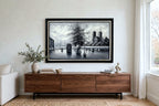 Styled lifestyle photo — the Paris Notre-Dame street scene oil hanging at true scale above a modern walnut credenza in a bright living room (styled display inspiration)