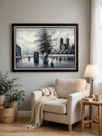 Styled lifestyle photo — the Paris Notre-Dame street scene oil hanging at true scale in a reading corner with an armchair, side table and lamp (styled display inspiration)