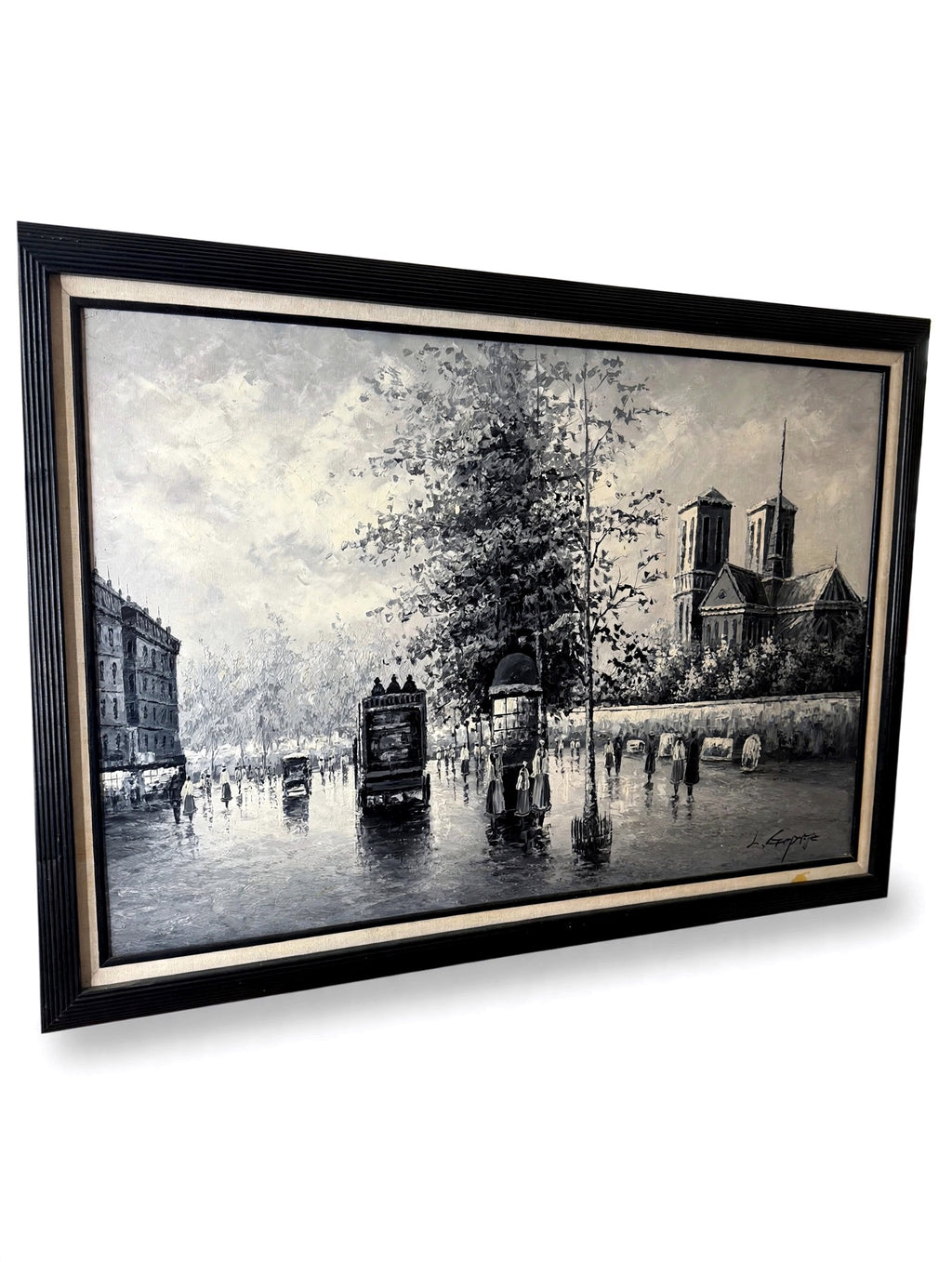 Paris Notre-Dame street scene oil on canvas — angled three-quarter view on a clean white background, showing the depth of the black frame