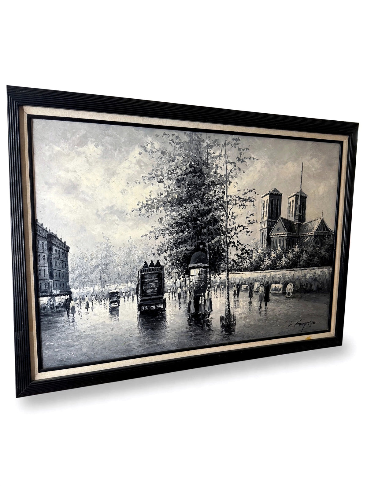 Paris Notre-Dame street scene oil on canvas — angled three-quarter view on a clean white background, showing the depth of the black frame