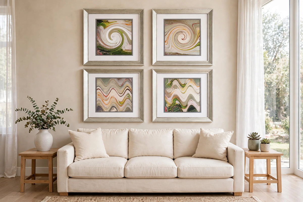 Styled lifestyle photo — the framed Paragon "Waving I–IV" abstract print set hung as a 2x2 grid above a cream sofa in a bright living room (display inspiration)