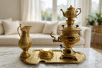 Samovar collection styled on a marble-top credenza in a bright living room (display inspiration)