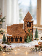 Department 56 Dickens' Village Church in a bright tabletop Christmas vignette with fairy lights – styled display inspiration