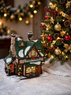 Styled photo - Quilly's Antiques beside a decorated Christmas tree (display inspiration)