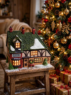 Styled photo - Nicholas Nickleby Cottage beside a decorated Christmas tree (display inspiration)