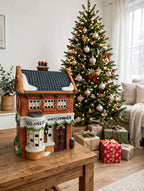 Styled photo - Geo Weeton Watchmaker beside a decorated Christmas tree (display inspiration)