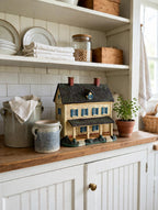 Meadowbrook Farm House styled on a farmhouse kitchen hutch with stoneware crocks — display inspiration