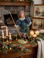 Lord of Misrule displayed on a fireplace mantel with Christmas garland and candles - display inspiration