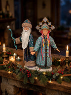 Grandfather Frost & Snowmaiden displayed on a fireplace mantel with Christmas garland and candles - display inspiration