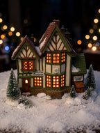 Department 56 Dickens' Village Hembleton Pewterer 1992 #5800-9 – styled display inspiration: shown lit at night on a snowy tabletop village display