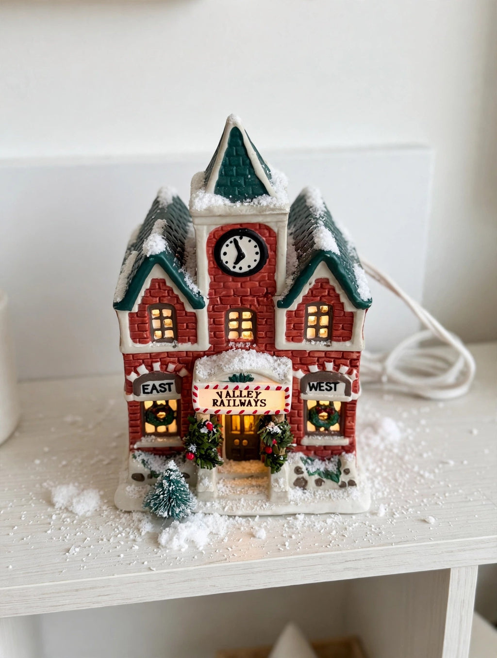 Valley Railways station styled on a display shelf with snow — styled scene, display inspiration only (enhanced photo)