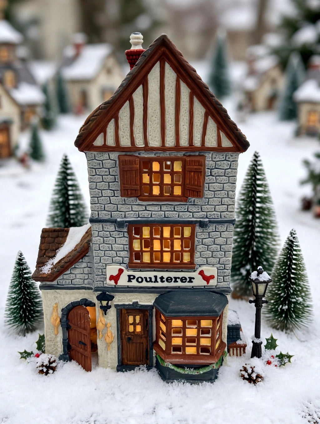 Department 56 Dickens' Village Poulterer 1988 lighted porcelain poultry shop — styled scene: tabletop village with bottle-brush trees and lamppost (display inspiration)