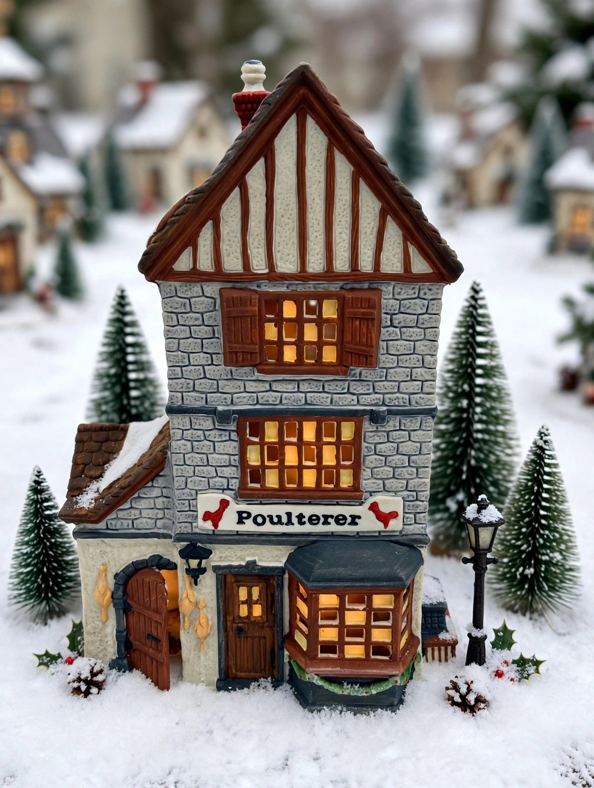 Department 56 Dickens' Village Poulterer 1988 lighted porcelain poultry shop — styled scene: tabletop village with bottle-brush trees and lamppost (display inspiration)