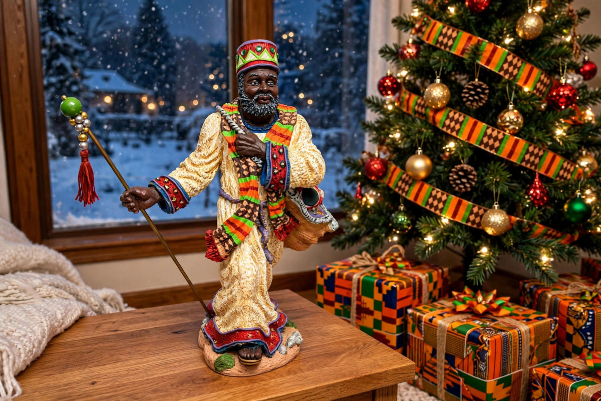 Styled display inspiration — the African American Santa beside a Christmas tree with kente ribbon and African-print wrapped gifts, shown at true 12-inch scale