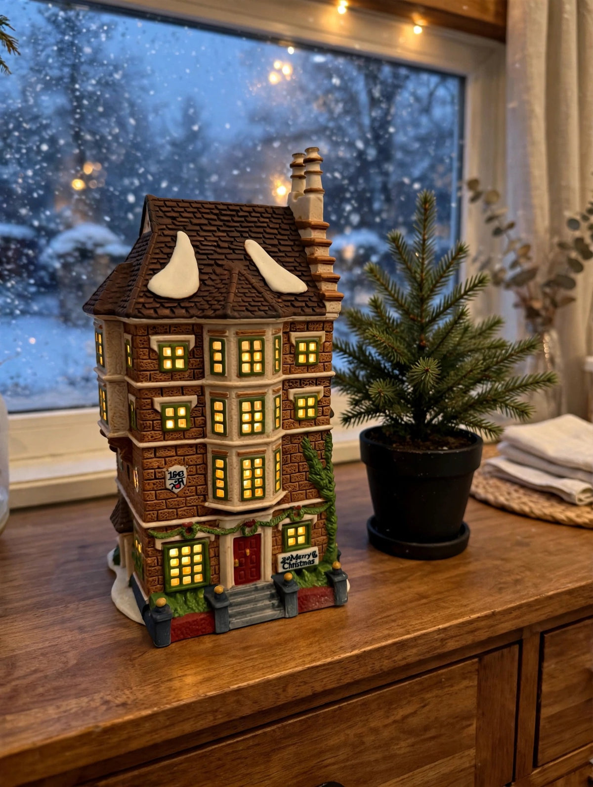 Department 56 Nephew Fred's Flat, Dickens' Village, 1991 – shown lit by a frosted window at dusk (styled display inspiration)